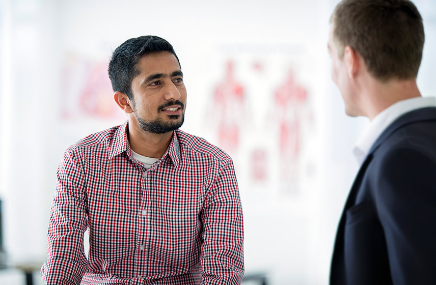 Cleveland Clinic London caregiver and patient having a conversation.