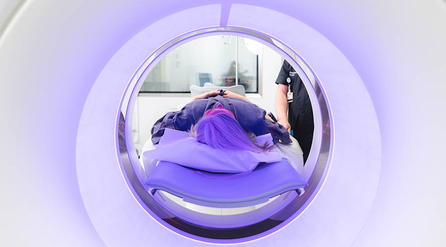 Patient in a CT machine.