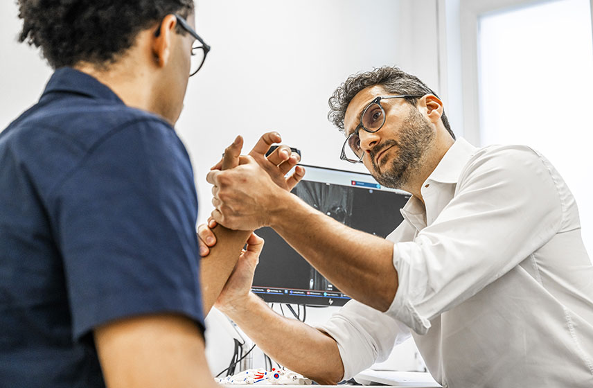 London consultant with patient.